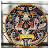 FAIENCE POTTERY CHARGER  |  "PRQS" showing mythical figures / beasts amongst mirrored scrolling foli