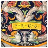 "PRQS" showing mythical figures / beasts amongst mirrored scrolling foliage, no apparent markings on