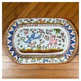 PORTUGUESE FAIENCE PLATTER  |  Faience pottery platter decorated with a bird and deer in a landscape