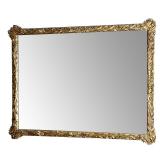 GILT CARVED WALL MIRROR  |  With nice floral and leafy carvings all around - w. 45.5 x h. 35.5 in.