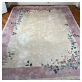CHINESE WOOL RUG  |  Nichols-style rug, having a beige ground with scrolling floral sprays and a lig