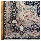 FRENCH STYLE CARPET  |  Central medallion on an indigo field within shaped concentric borders - l. 8