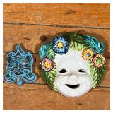 (2pc) CERAMIC WALL MASKS  |  A figural mask and a small blue tribal mask stamped inside "Ceramiche M