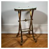 BRASS SIDE TABLE  |  Having an oval mirrored top, with a medial glass shelf - l. 18 1/2 x w. 11 3/4 