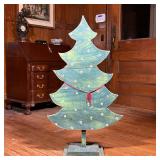 PAINTED WOOD CHRISTMAS TREE  |  Signed on the back, "Sun Garden" - w. 26.5 x h. 47.5 in.