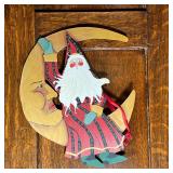 HOUSE OF HATTEN SANTA | Wall hanging decoration of Santa sitting on the moon, signed and dated on ve