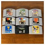 NINTENDO 64 GAMES & CASE  |   Including nine N64 game cartridges in a slide out case - l. 12 in.