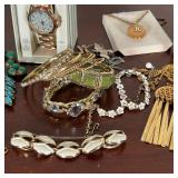 GROUP COSTUME JEWELRY  |   Vintage costume jewelry including necklaces, a watch, a bracelet, pins, e