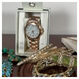 GROUP COSTUME JEWELRY  |   Vintage costume jewelry including necklaces, a watch, a bracelet, pins, e