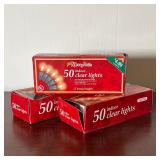 CHRISTMAS TREE IN BAG  |  Faux Christmas tree in a red carrying bag, with lights - l. 50 in. (bag)