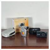 (3pc) EARLY CAMERAS  | Early digital cameras including a Canon PowerShot with box, Vivitar video cam