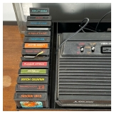 Asteroids, Frogger, Star Raiders, Space Invaders, and more, with joystick controllers and a Star Rai