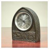 TIFFANY ZODIAC CLOCK  |   Tiffany Studios New York desk clock with an arched bronze case, having zod