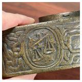 TIFFANY ZODIAC CLOCK  |   Tiffany Studios New York desk clock with an arched bronze case, having zod