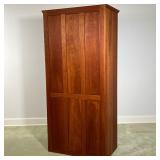 THOMAS MOSER CHERRY CABINET  |   Having cabinet doors, revealing an interior with adjustable shelves