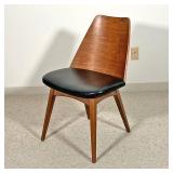 FOSTER-MCDAVID MID CENTURY SIDE CHAIR  |   Having a vinyl seat and formed plywood back rest on a fou
