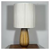 BULBOUS CERAMIC LAMP  |  Gadrooned pattern ceramic on a turned wood base no apparent signature - h. 