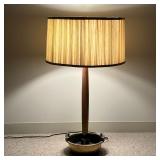 BRASS AND WOOD TABLE LAMP  |   The lower section having a brass base in with handles and two removab