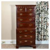 BAKER NARROW DRESSER  | Designed in two sections, appearing to be of one piece construction, the upp