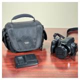 SONY CAMERA  | Sony DSC-HX1 camera in LowePro bag with battery charger - l. 9 x w. 4.5 x h. 6 in. (a