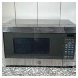 GE MICROWAVE  | Stainless steel General Electric microwave, 700 watts - l. 17 x w. 13 x h. 10 in.