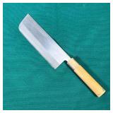 JAPANESE CHEFS KNIFE  | 6.75 inch blade with incised markings, having a wood and horn handle call m