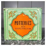 CHINESE TEAPOT  | Brown clay Chinese teapot with bamboo-form handle with four matching lidded cups -