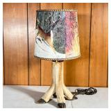 DEER FOOT LAMP | Four legged lamp made of four deer feet with lampshade featuring photos of deer