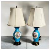 (2pc) PAIR FLORAL TABLE LAMPS | Pair of table lamps with floral motif in reserves over turquoise fie
