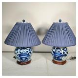 (2pc) PAIR GINGER JAR LAMPS | Pair of Asian blue & white ginger jar lamps on wooden base; glazed