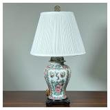 GILT ENAMELED LAMP | Chinese famille rose bulbous jar convereted into a lamp, decorated with scenes