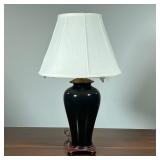 BLACK PORCELAIN BALUSTER LAMP | Monochrome noire baluster-form vase on a carved wood base, converted