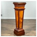 PANELED WOOD DISPLAY PEDESTAL | Contrasting panels and tapering form decorated with various patterns