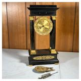 REGAL SHELF CLOCK | Open face shelf clock with shell motifs surrounding the engine turned clock face