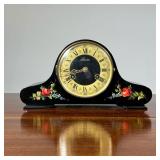 SCHLENKER MANTEL CLOCK | Erich Schlenker, Germany, black lacquered case painted with flowers - l. 12