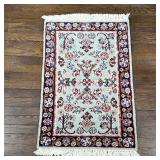 HAND KNOTTED KASHAN | Kashan mat, pale green field with blue border - l. 36 x w. 24 in. 