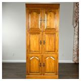 ETHAN ALLEN ENTERTAINMENT CABINET | Having three sections of double doors, the center section with a