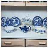 COLLECTION OF BLUE & WHITE CHINA | Including a Wedgwood teapot, four plates, a lidded tureen, and tw