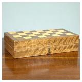 CARVED STONE CHESS SET | Travel chess set with a lacquered brass inlaid case folding open to reveal 
