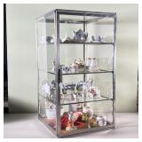 CURIO DISPLAY CASE | A collection of miniatures, housed in a glass display cabinet, with various por