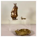 (3pc) MISC. BRASS TRINKETS | Three brass items including: a frog king waiting to be kissed; a duck; 