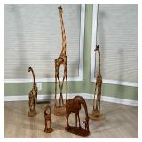 (5pc) CARVED GIRAFFES | Carved wood giraffe figures - h. 12 in (shortest) - h. 58 in. (talles) 