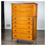 SCHMIEG & KOTZIAN TALL CHEST | Tiger maple and inlaid in contrasting woods, concave front 