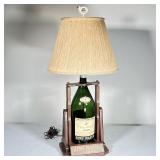 REMY MARTIN LAMP |Large E. Remy Martin Cognac bottle converted into a table lamp with a wooden stand