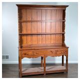 ETHAN ALLEN HUTCH |Having two plate shelves over an open shelf with three drawers with sculpted apro