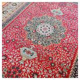 double shuttle / super woolen carpet"; blue and white medallion over a red field with ornate scrollw