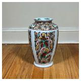 CHINESE BUTTERFLY VASE | Hand painted porcelain vase depicting a swarm of colorful butterflies or 