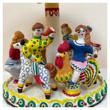  of children on a merry-go-round (signed and dated 1995) - h. 9 in. (female figure) 