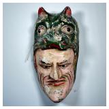 CARVED ASIAN MASK | Polychrome wood carved mask of man wearing head of an animal - l. 8 x w. 8 x h. 