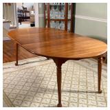 Extension Dining Table | Light colored wood with three leaves (each leaf 12 in.), collapses to round